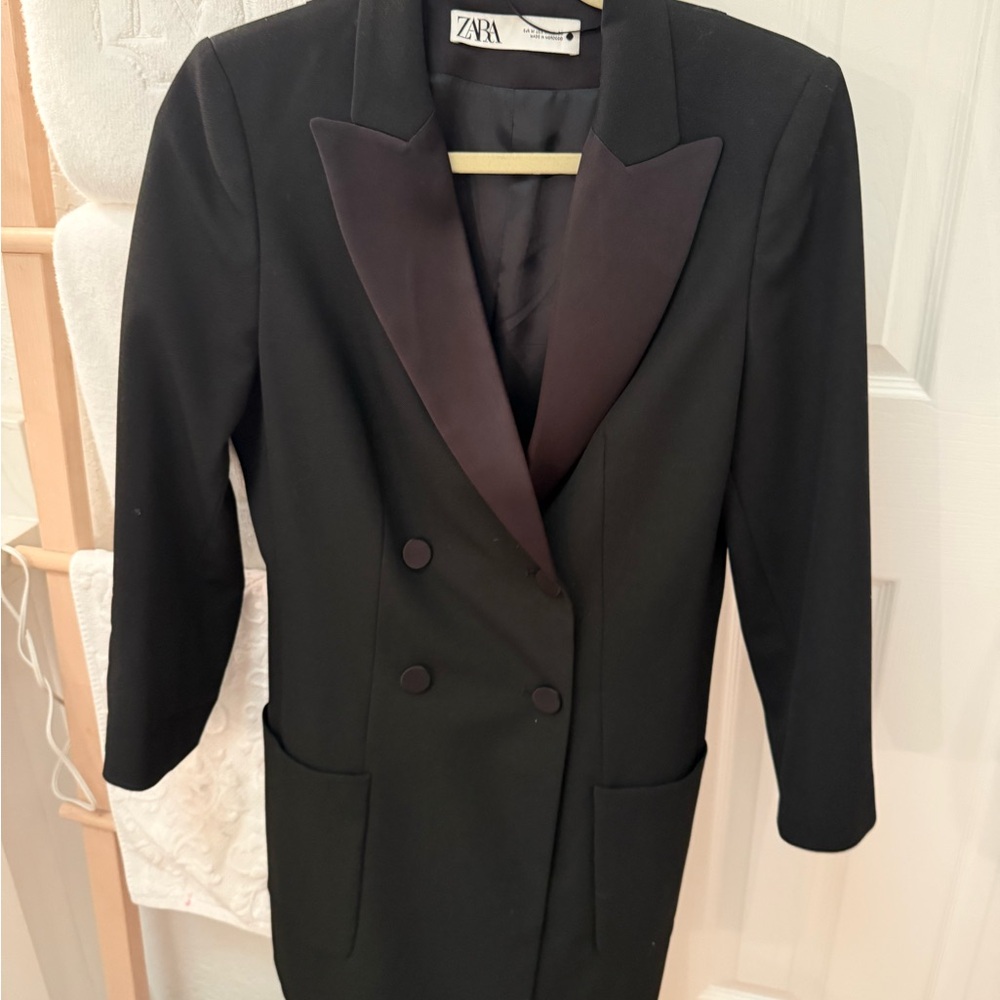 Black Double-Breasted dress with satin accents. Fully lined. Wore  only once.